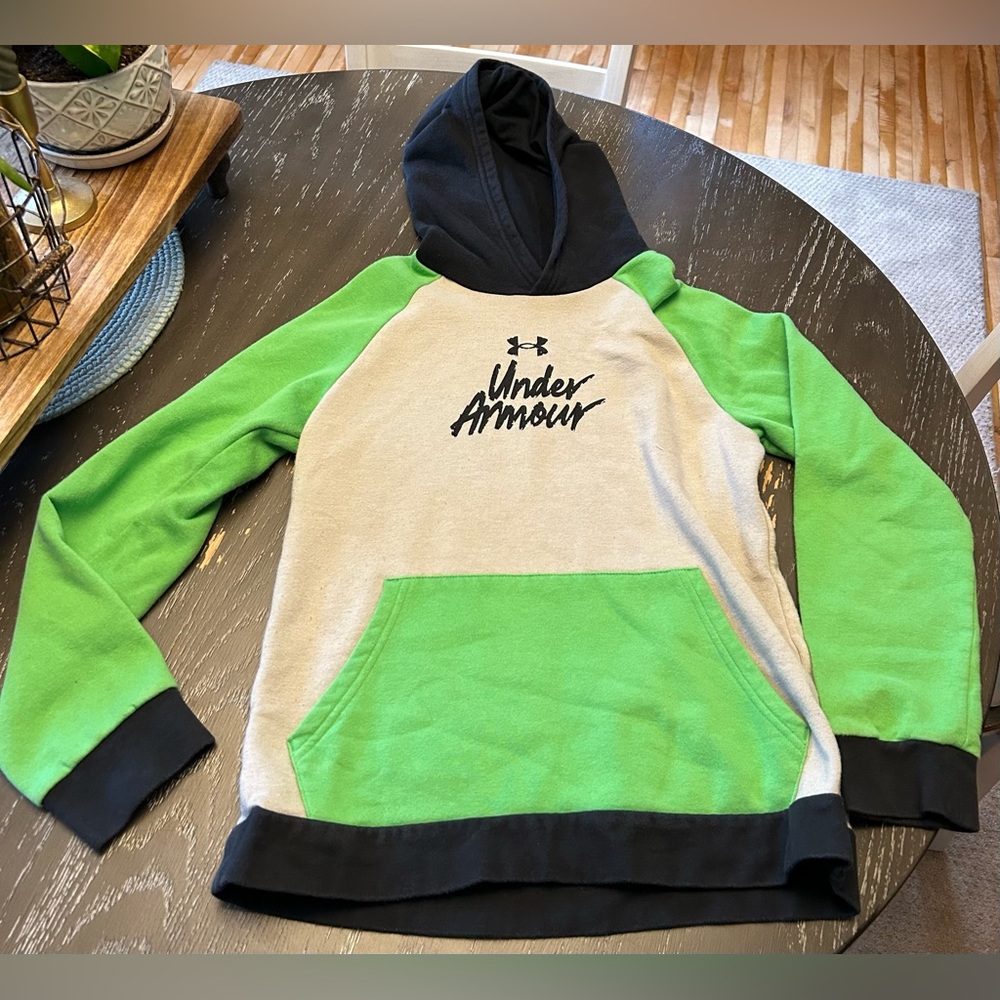 Very unique worn in, comfy hoodie size kids Large.  Gray/Green/Black in color.